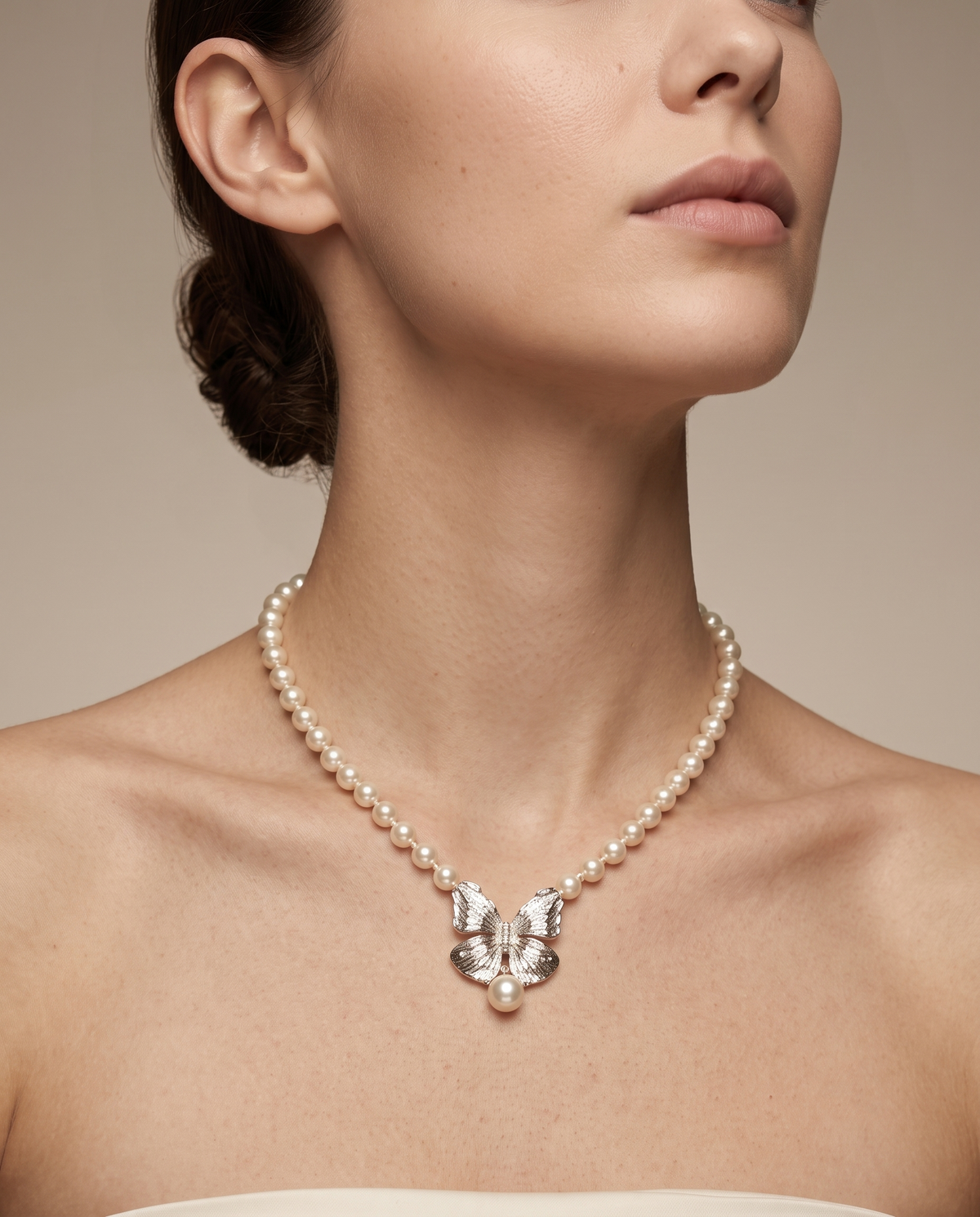 Silver butterfly pearl strand necklace