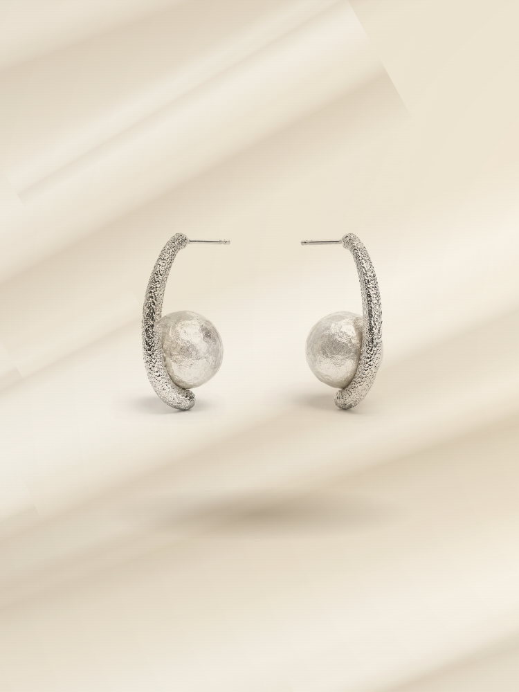 METALIKA STUDIO earrings collection - sculptural brass earrings on silk