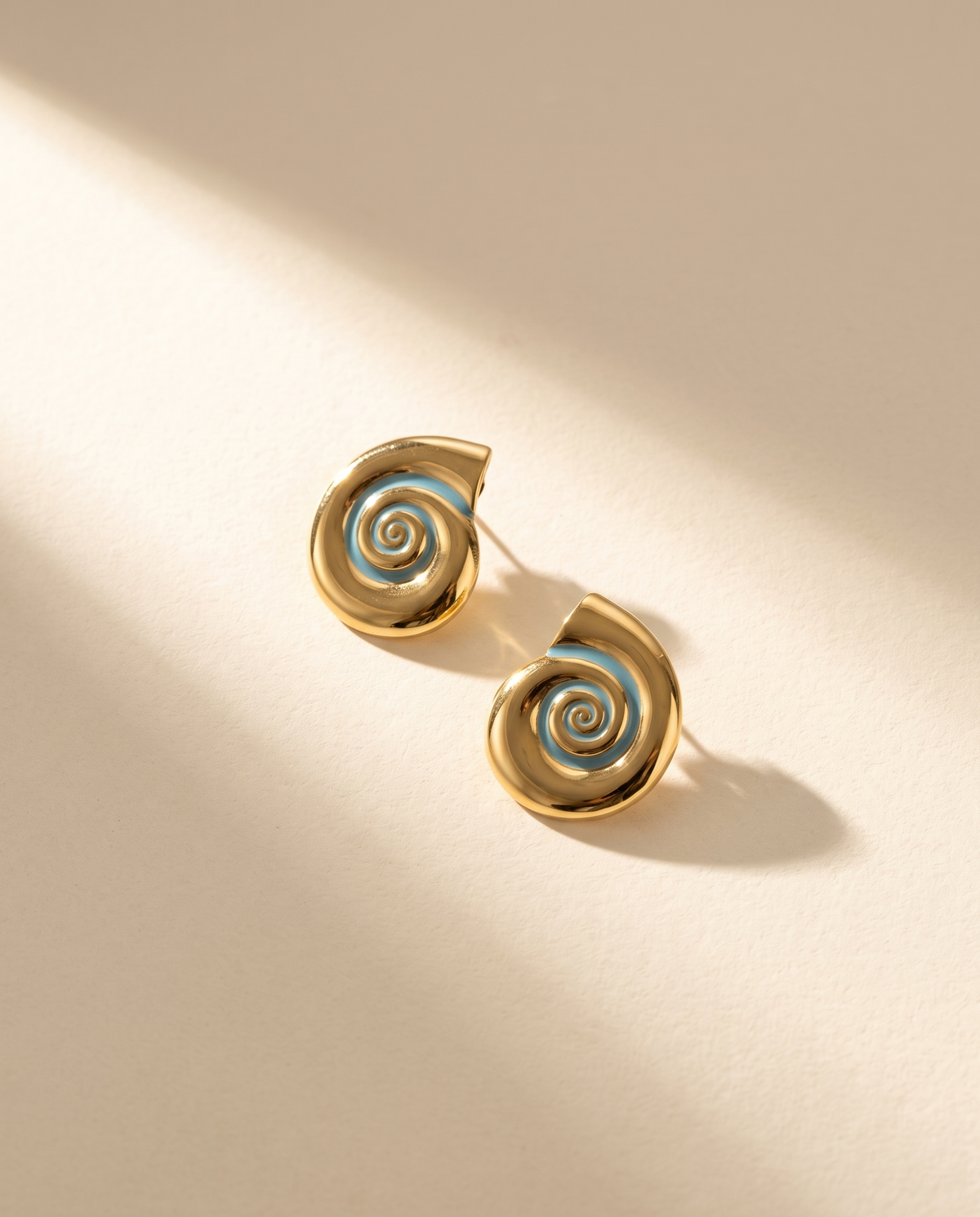 SERENA GOLD SWIRL EARRING
