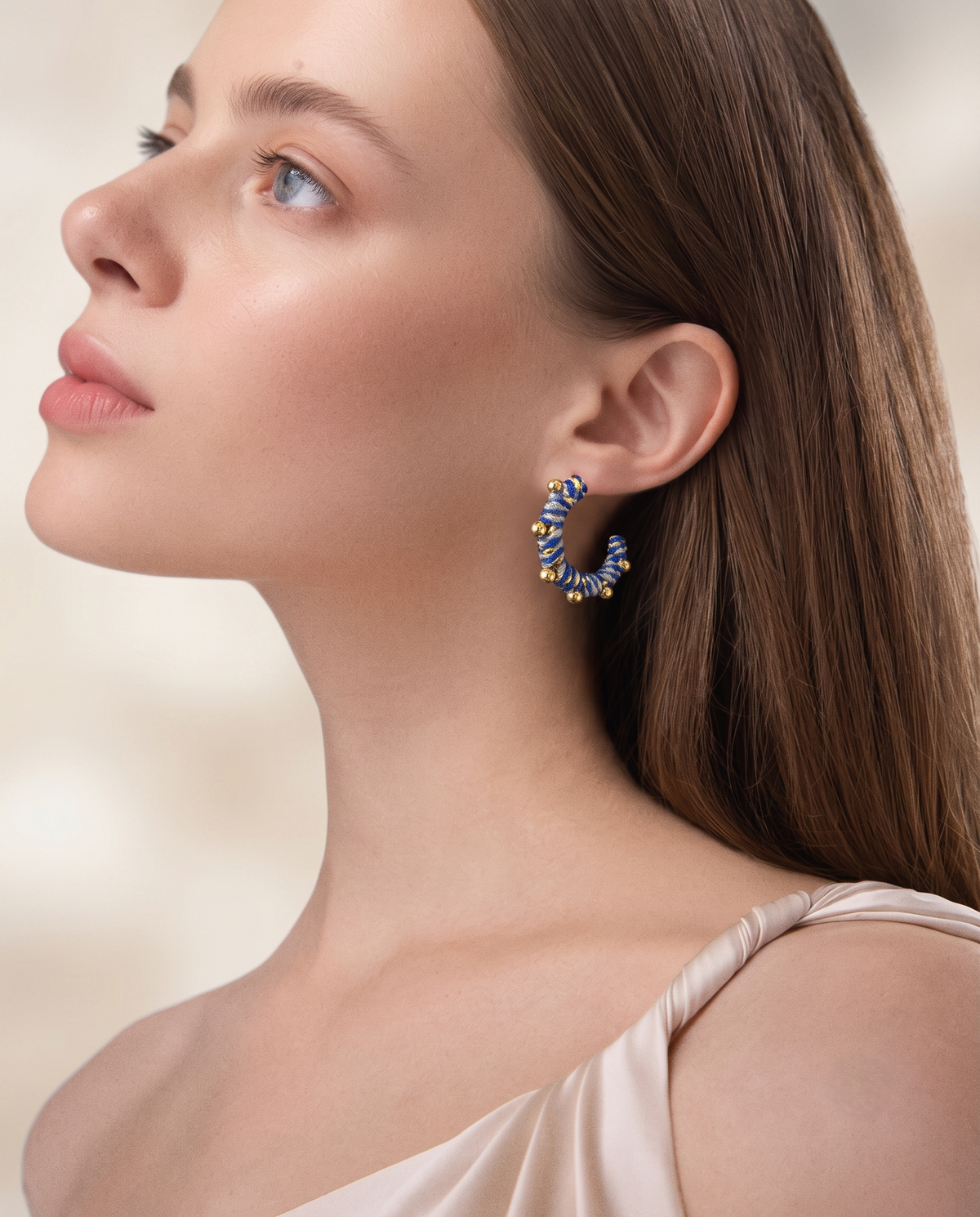 TWISTED ORBIT HOOP EARRING