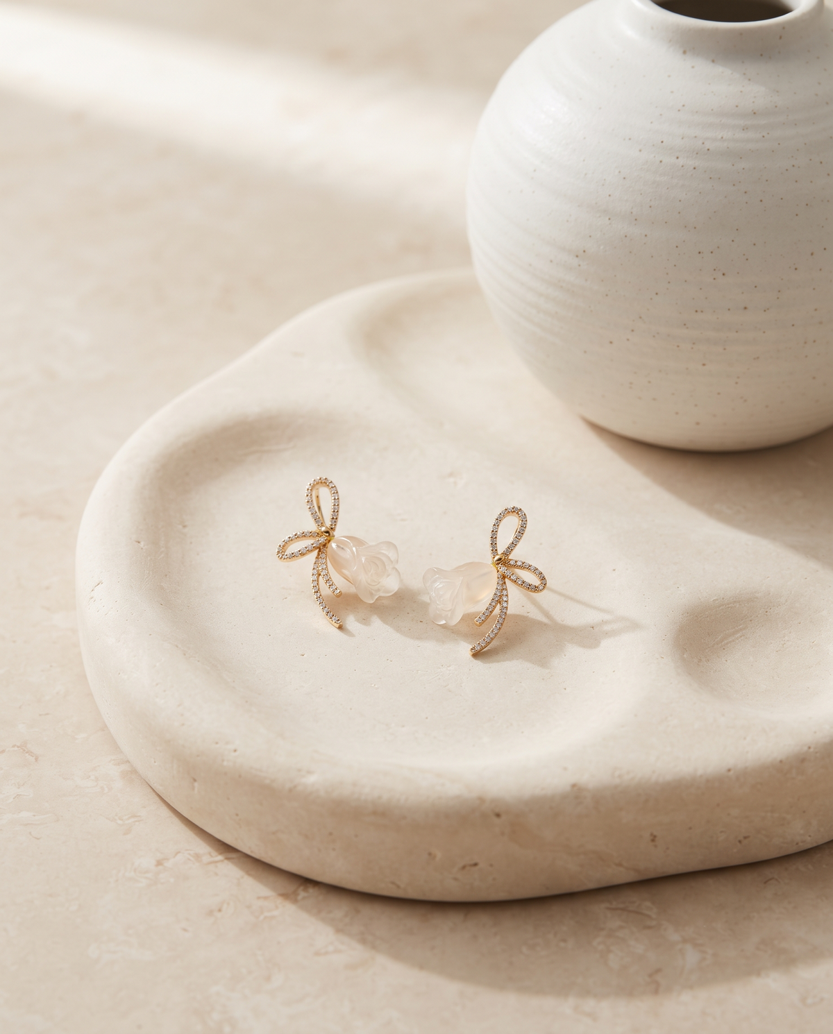 PEACH ROSEBUD ROPE BOW STUD EARRING