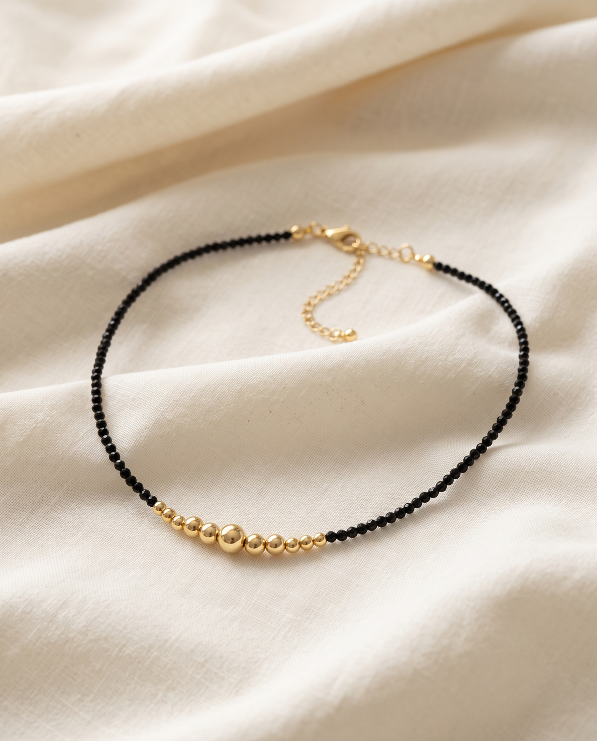 GRADUATED ORB BEAD NECKLACE